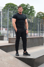 Įkelti vaizdą į galerijos rodinį, Juodos spalvos vyriškos treniginės kelnės