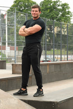 Įkelti vaizdą į galerijos rodinį, Juodos spalvos vyriškos treniginės kelnės
