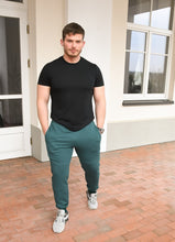 Įkelti vaizdą į galerijos rodinį, Žalios spalvos vyriškos treniginės kelnės